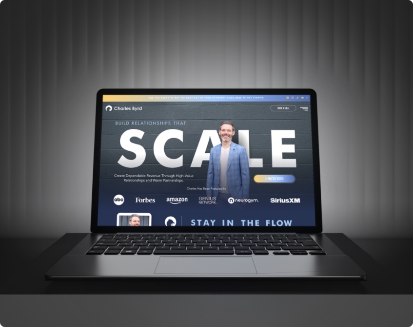 Charles Byrd website on a laptop