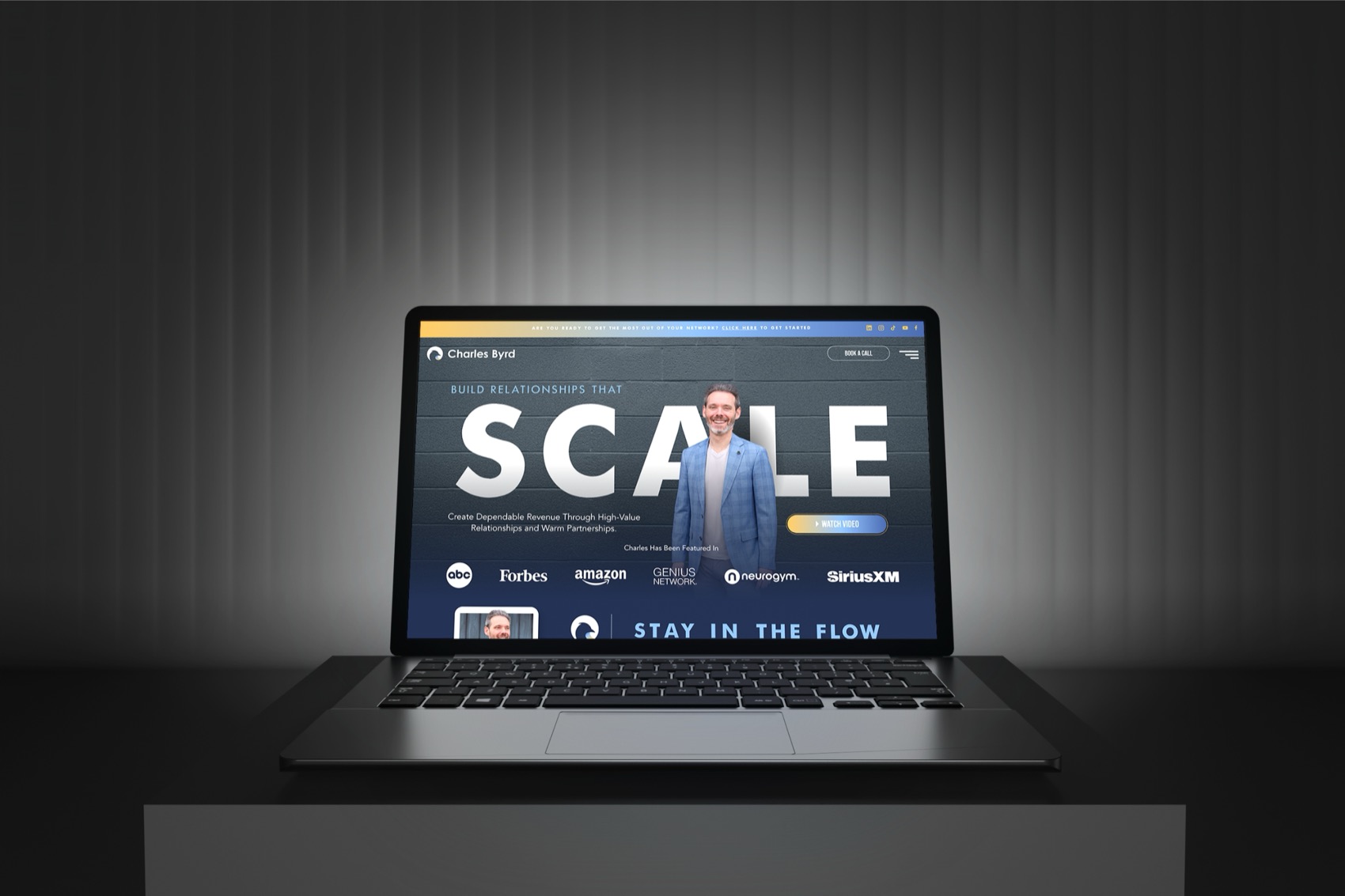 Charles Byrd website on a laptop with the headline Scale