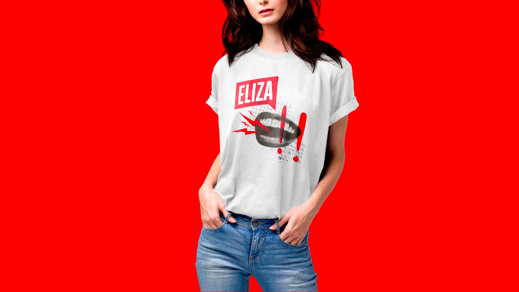 Woman wearing an Eliza t-shirt on red