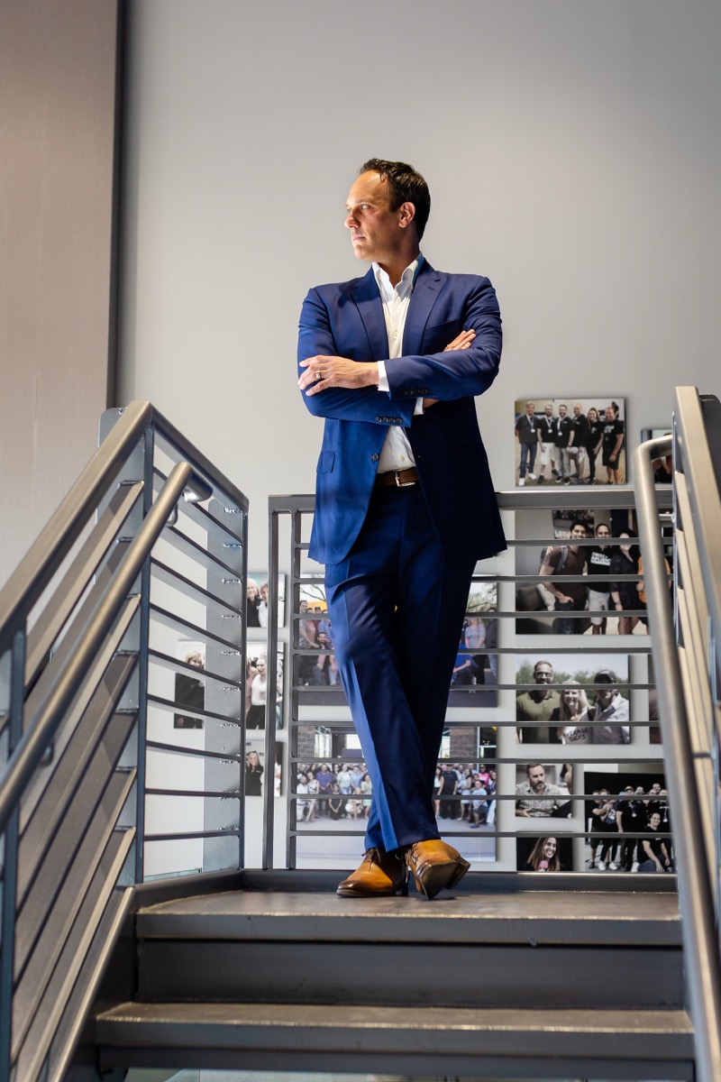 Michael Bernoff standing on a staircase