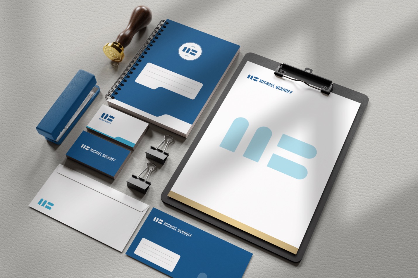 Michael Bernoff stationery: letterhead, cards, envelopes and a notebook