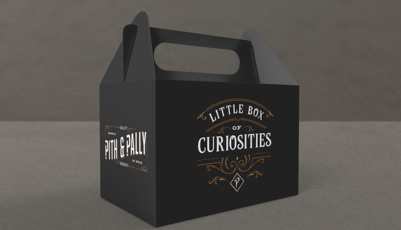 Black Pith & Pally to-go box labeled Little Box of Curiosities