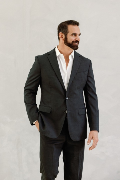 Marcus Capone in a dark suit