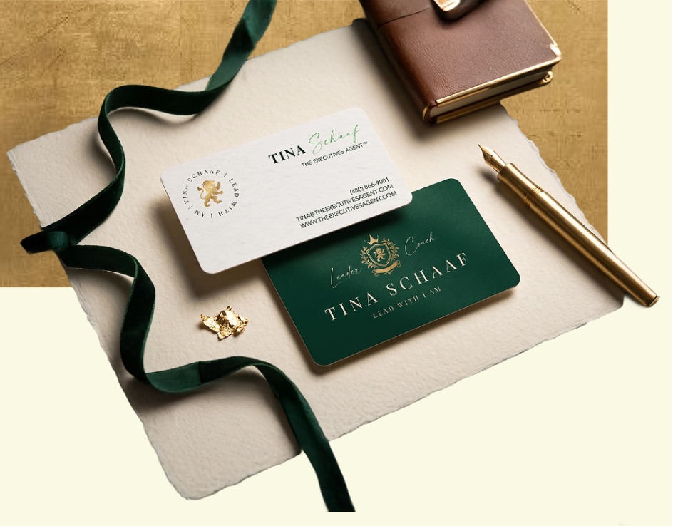 Tina Schaaf business cards in white and emerald with a gold crest